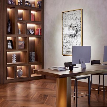 Movenpick Jumeirah Village Triangle Dubai Buitenkant foto The library at the hotel