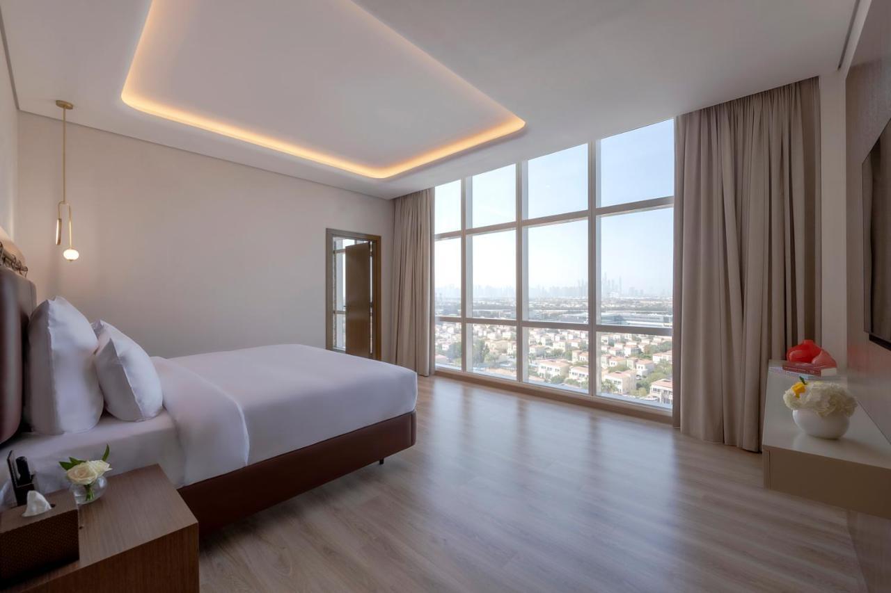 Movenpick Jumeirah Village Triangle Dubai Buitenkant foto Suite bedroom