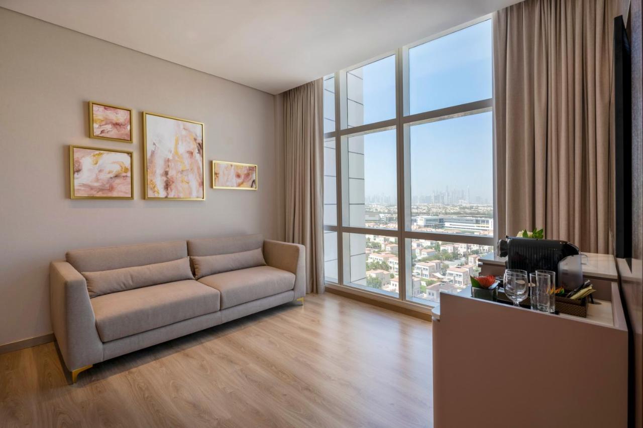 Movenpick Jumeirah Village Triangle Dubai Buitenkant foto Office