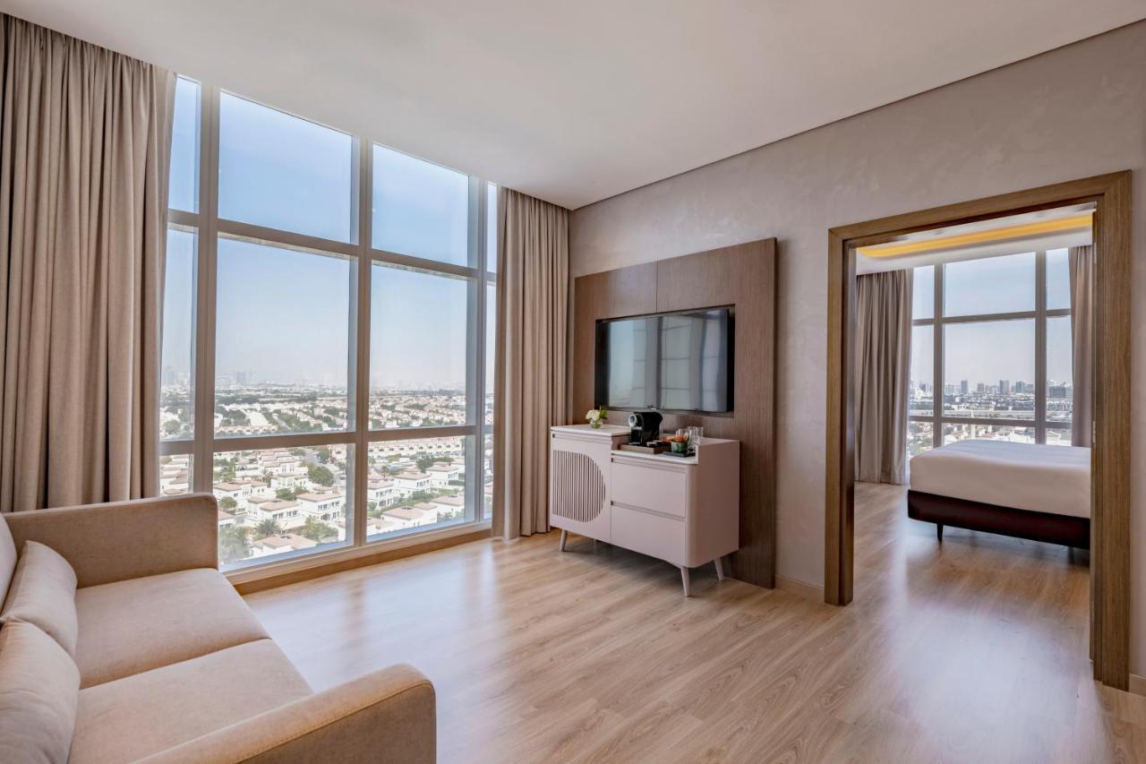 Movenpick Jumeirah Village Triangle Dubai Buitenkant foto Suite