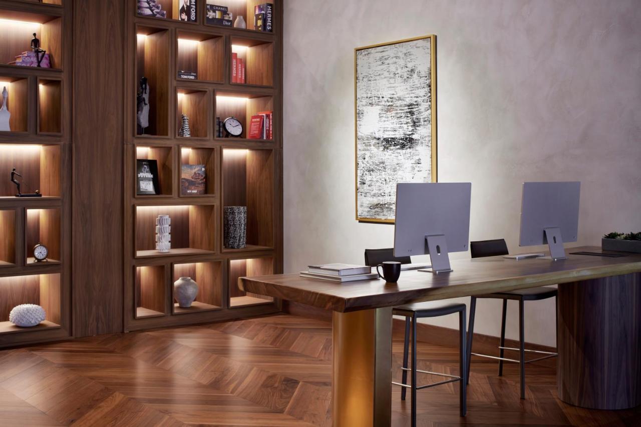 Movenpick Jumeirah Village Triangle Dubai Buitenkant foto The library at the hotel