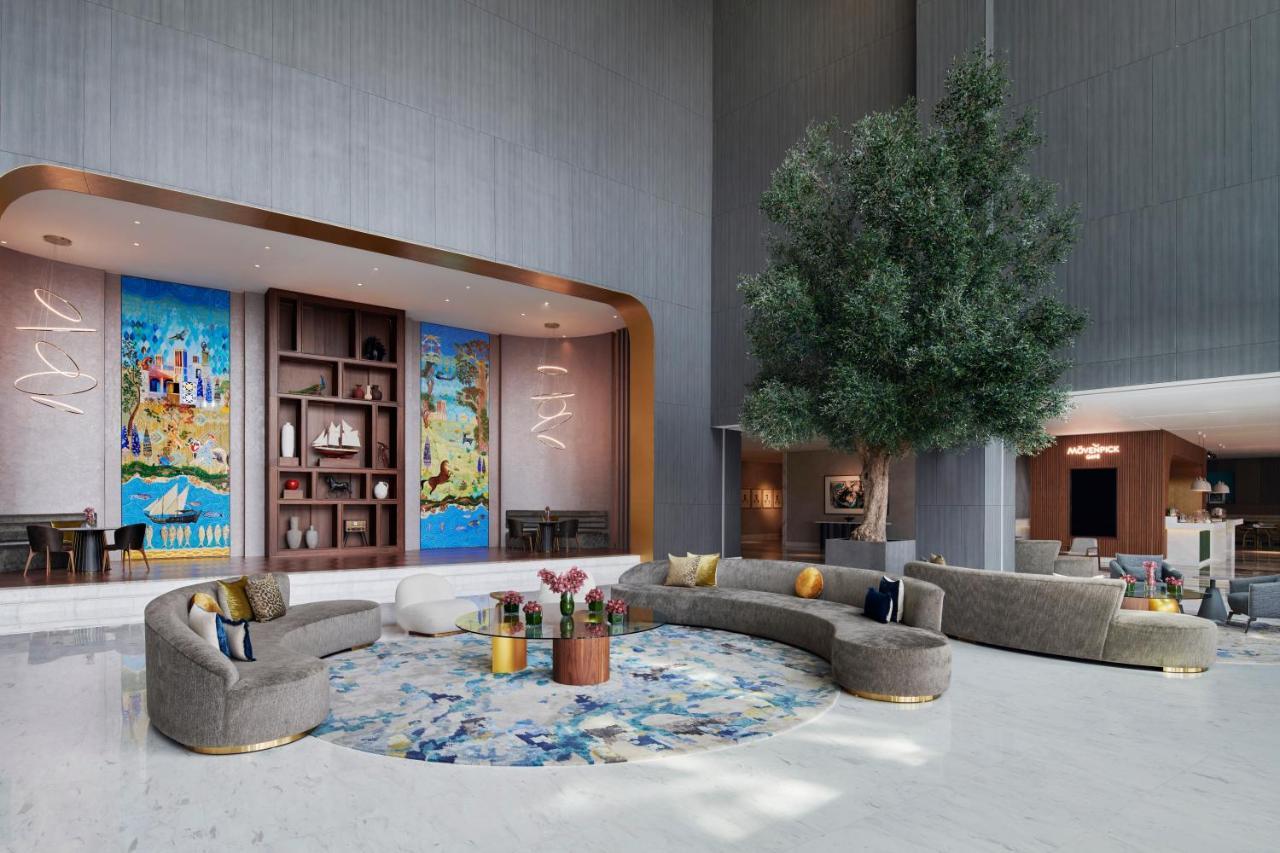 Movenpick Jumeirah Village Triangle Dubai Buitenkant foto The lobby of the hotel