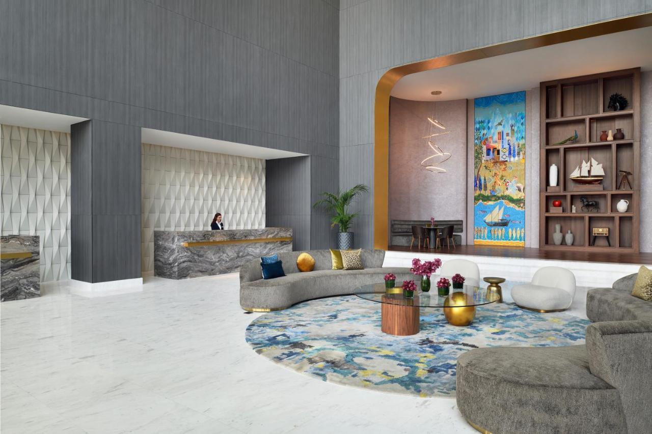Movenpick Jumeirah Village Triangle Dubai Buitenkant foto The lobby of the hotel