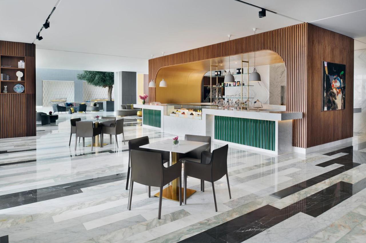 Movenpick Jumeirah Village Triangle Dubai Buitenkant foto Interior of the hotel